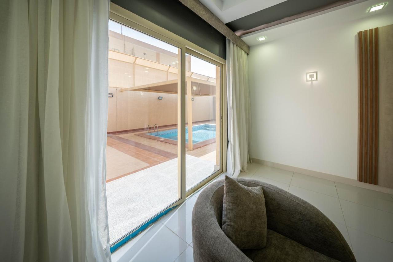 Mirada Gold Jizan - Resort & Private Pools Luaran gambar A sliding window